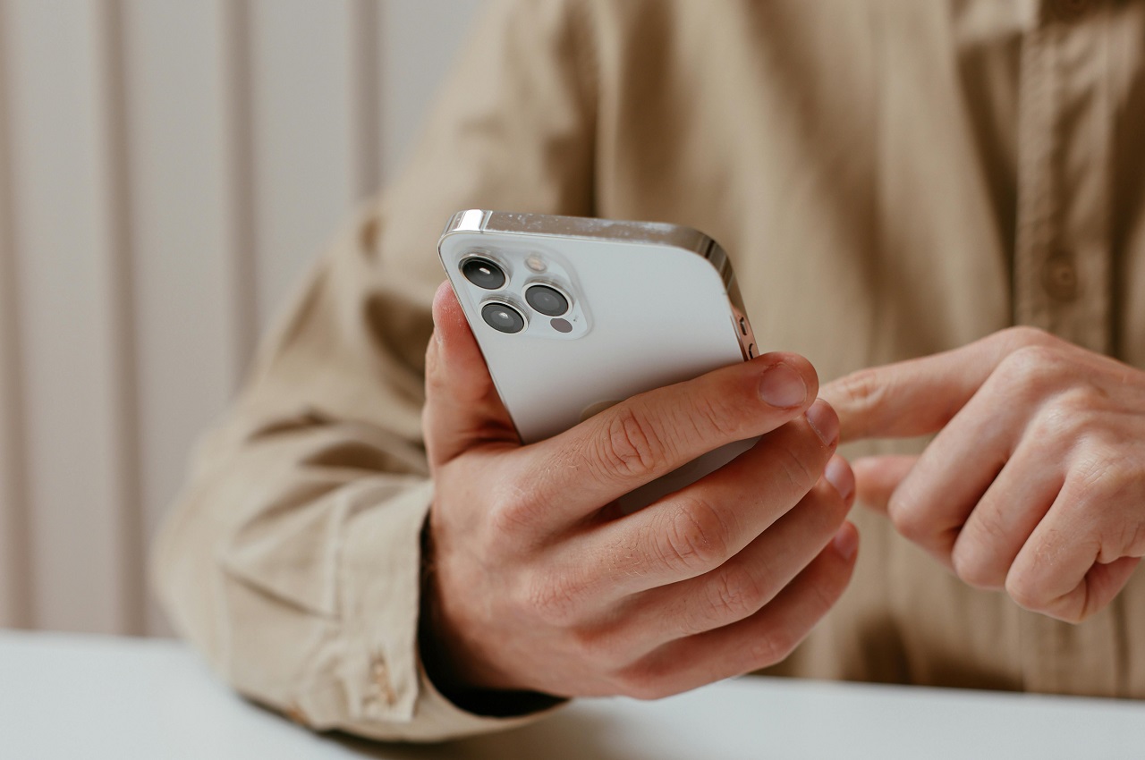 adult with cell phone
