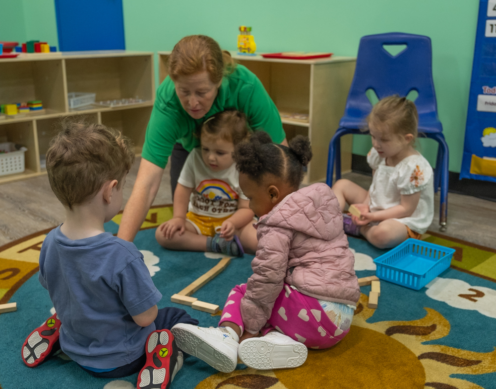 children learning with teacher