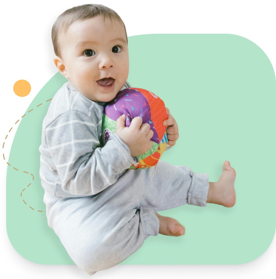 infant playing with toy